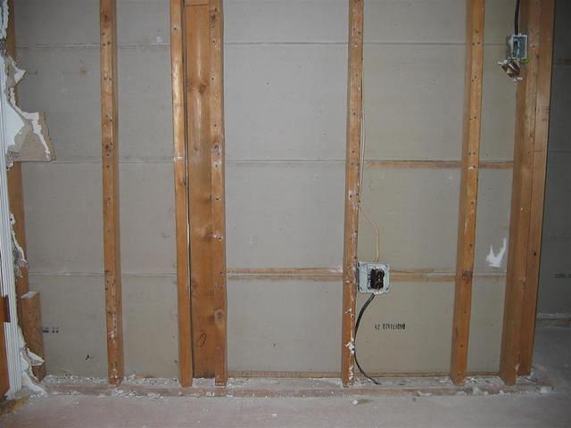 Old spare bedroom wall opposite foyer & coat closet